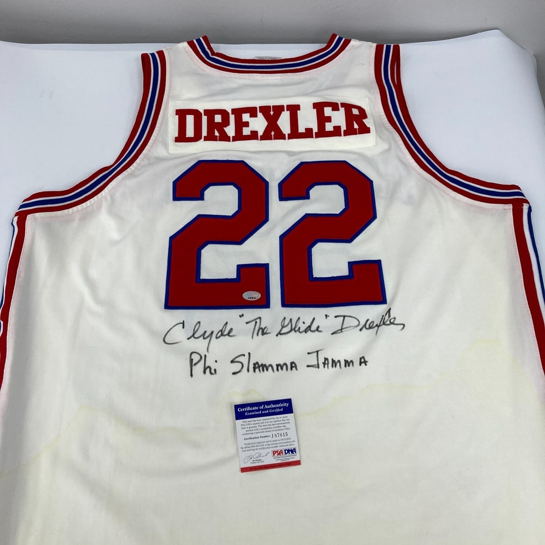 Clyde Drexler Signed 1983 Houston Cougars Jersey with JSA Authentication: Clyde Drexler Signed 1983 Houston Cougars Jersey with JSA Authentication Celebrate the legacy of Clyde Drexler with this authentic 1983 Houston Cougars jersey, featuring his iconic "Phi Slama Jama" st