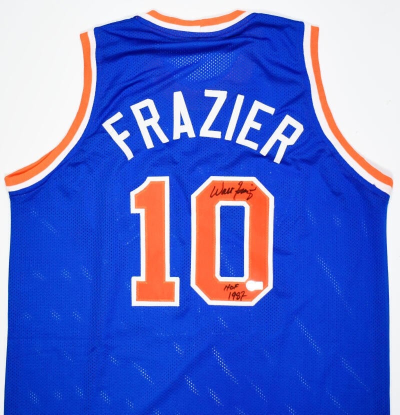 Walt Frazier Knicks Blue Pro Style Signed Jersey Beckett Hologram HOF: Walt Frazier Knicks Blue Pro Style Signed Jersey Beckett Hologram HOF This is a blue pro style basketball jersey autographed by Walt Frazier, featuring a Hall of Fame (HOF) inscription. The jersey is 