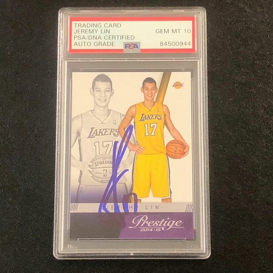 Jeremy Lin Autographed 2014 Panini Prestige Lakers Card PSA Encapsulated: Jeremy Lin Autographed 2014 Panini Prestige Lakers Card PSA Encapsulated This is a 2014-15 Panini Prestige #92 basketball trading card featuring Jeremy Lin of the Los Angeles Lakers. The card is signe