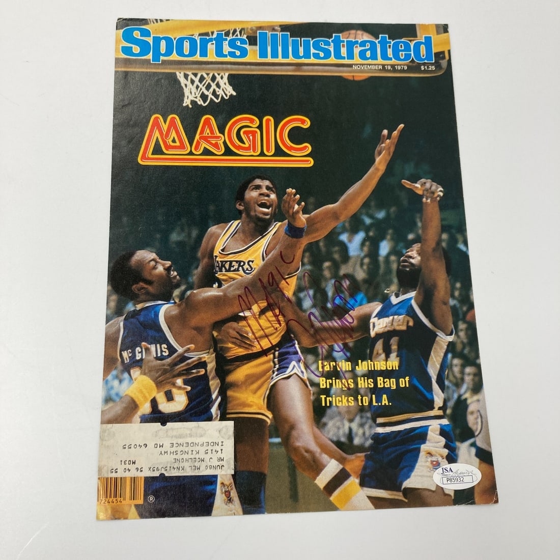 Magic Johnson 1979 Sports Illustrated Cover Signed with JSA COA: Magic Johnson 1979 Sports Illustrated Cover Signed with JSA COA This vintage 1979 Sports Illustrated cover features the iconic Magic Johnson and is boldly signed by the basketball legend himself. Acco