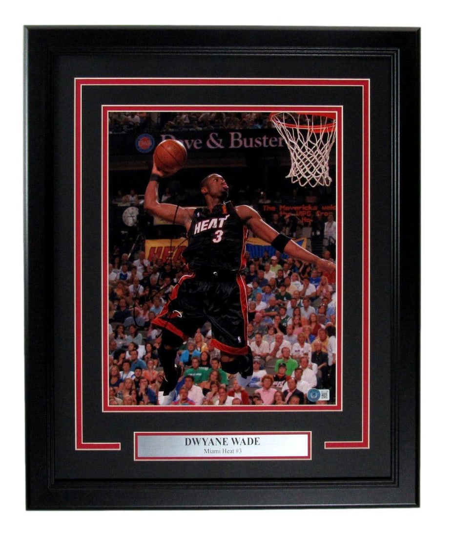 Dwyane Wade 11x14 Autographed Photo Miami Heat Framed BAS Certified: Dwyane Wade 11x14 Autographed Photo Miami Heat Framed BAS Certified Celebrate the legacy of Dwyane Wade with this stunning autographed 11x14 photo, beautifully framed to honor his career with the Miam