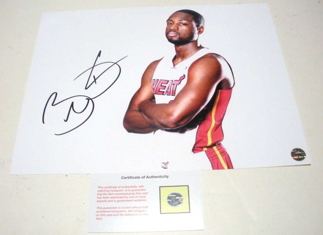 Autographed Dwyane Wade 8x10 Photograph Miami Heat With COA: Autographed Dwyane Wade 8x10 Photograph Miami Heat With COA This is a pre-owned 8x10 photo featuring Dwyane Wade of the Miami Heat, commemorating his achievements as an NBA Champion, MVP, and Hall of 
