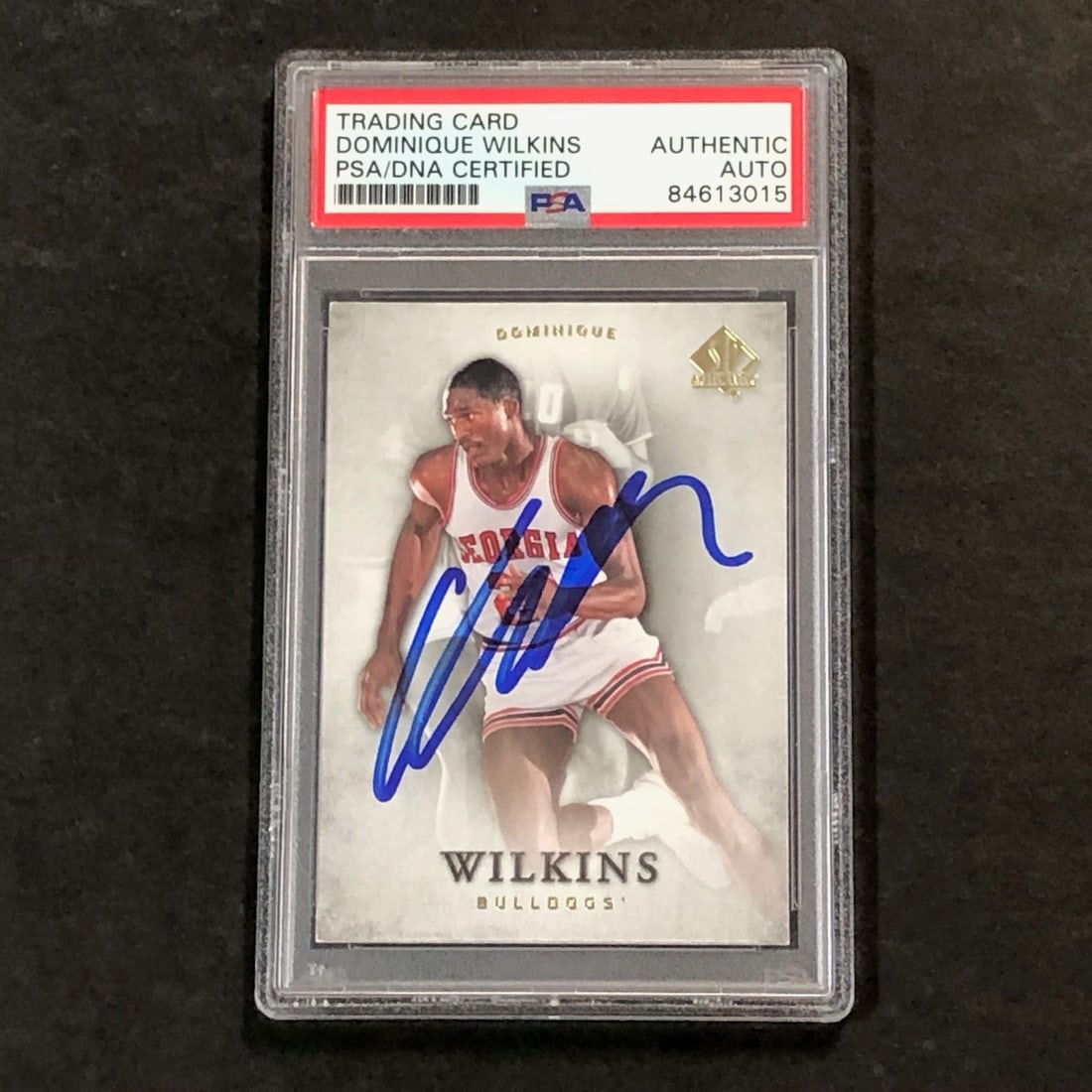 2012-13 SP Authentic #2 Dominique Wilkins Signed Card PSA Authenticated: 2012-13 SP Authentic #2 Dominique Wilkins Signed Card PSA Authenticated This is a 2012-13 SP Authentic #2 basketball card featuring the signature of Dominique Wilkins. The autograph has been authentic
