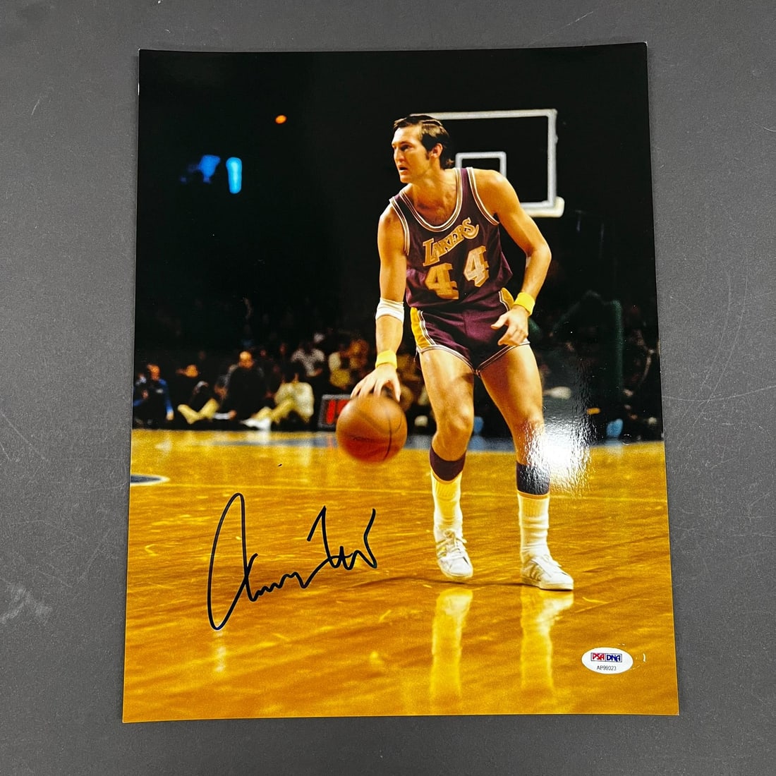 Jerry West Autographed 11x14 Lakers Photograph PSA/DNA Authenticated: Jerry West Autographed 11x14 Lakers Photograph PSA/DNA Authenticated This is a professionally printed 11x14 photograph signed by Jerry West, the legendary basketball player for the Los Angeles Lakers.