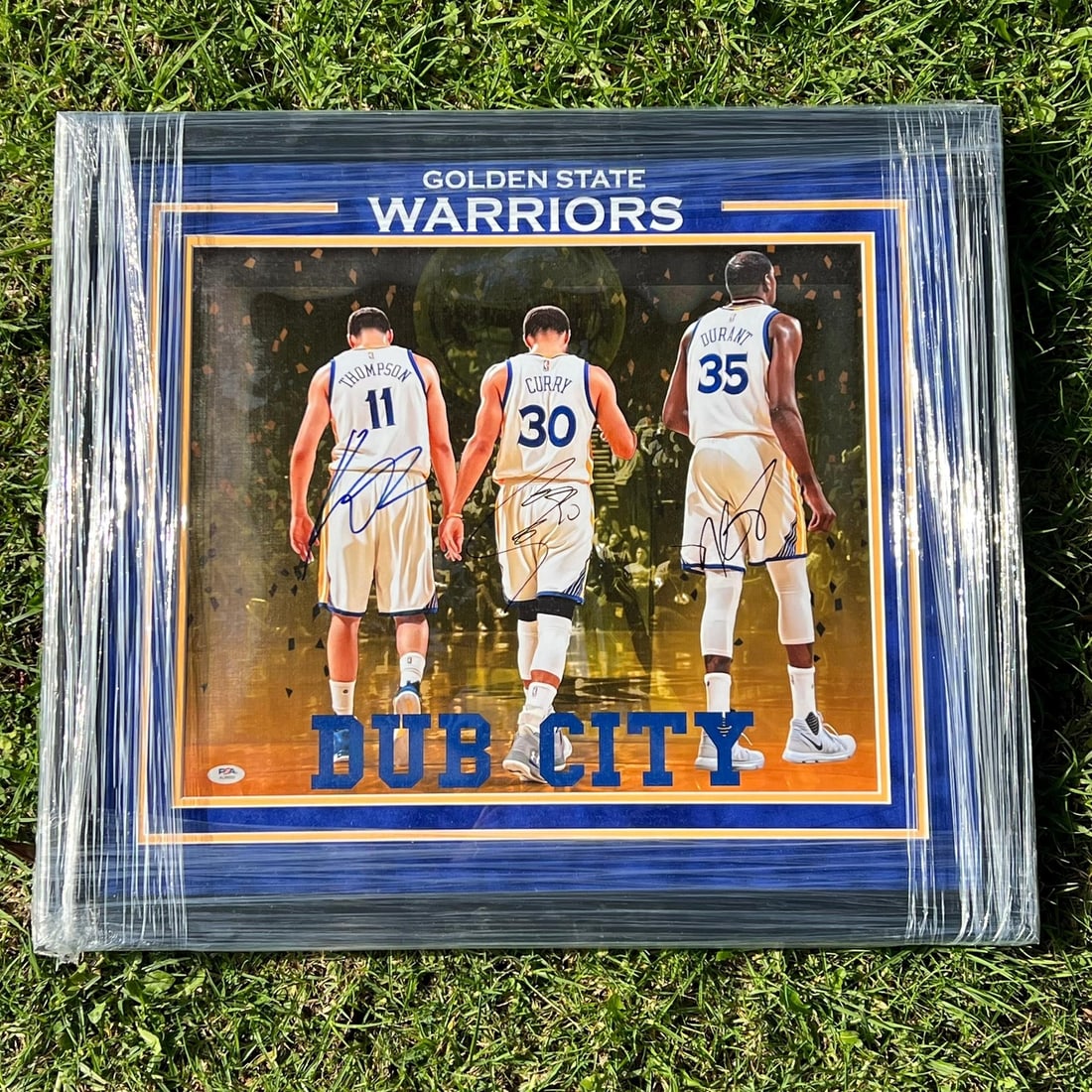 Steph Curry Kevin Durant Klay Thompson Signed Photo 20x27 Framed PSA/DNA Authenticated: Steph Curry Kevin Durant Klay Thompson Signed Photo 20x27 Framed PSA/DNA Authenticated This stunning framed photo features the autographs of basketball stars Steph Curry, Kevin Durant, and Klay Thomps