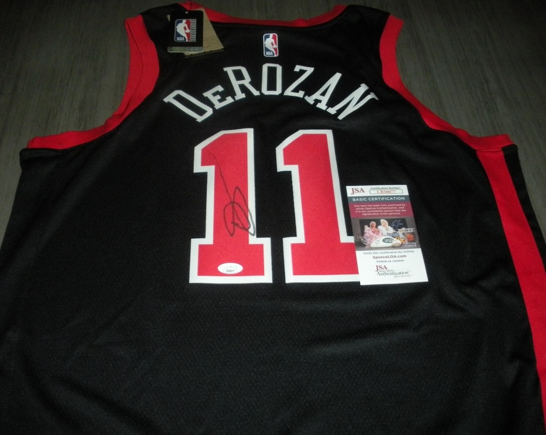 DeMar DeRozan Signed Chicago Bulls Nike Jersey with JSA COA: DeMar DeRozan Signed Chicago Bulls Nike Jersey with JSA COA This is an officially licensed Nike basketball jersey, signed by Demar DeRozan of the Chicago Bulls. It is an original item, perfect for col
