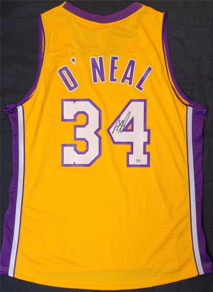 Shaquille O'Neal Signed 1999-00 Lakers Jersey PSA Authentication: Shaquille O'Neal Signed 1999-00 Lakers Jersey PSA Authentication This is an original, pre-owned Mitchell & Ness jersey from the 1999-00 season, expertly signed by basketball legend Shaquille O'Neal. T