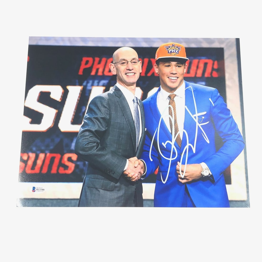 Devin Booker Autographed 11x14 Photo BAS Certified Phoenix Suns: Devin Booker Autographed 11x14 Photo BAS Certified Phoenix Suns This is an original 11x14 photograph featuring Devin Booker of the Phoenix Suns, professionally printed and autographed. The signature h