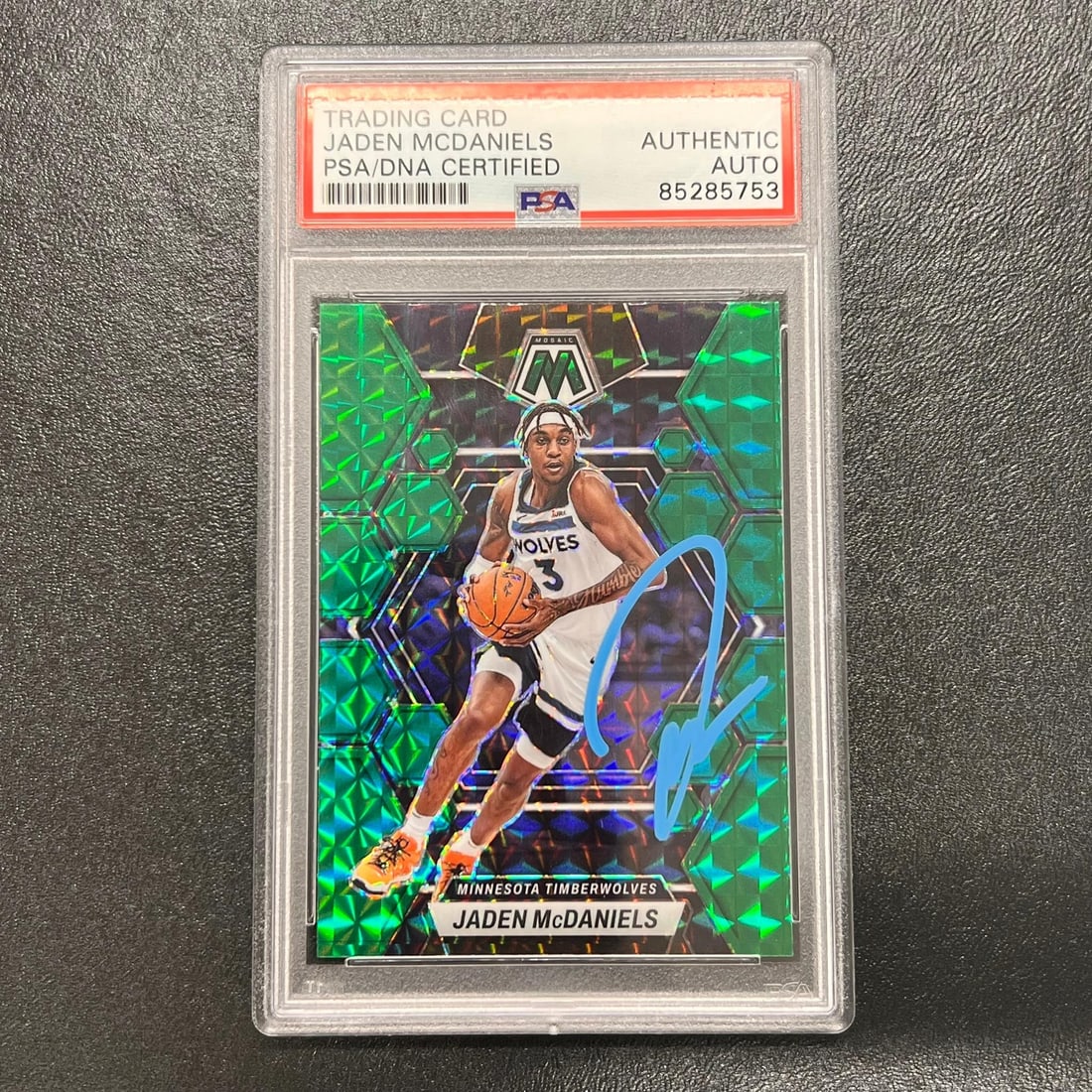2022-23 Panini Mosaic Jaden McDaniels Signed Card AUTO PSA/DNA: 2022-23 Panini Mosaic Jaden McDaniels Signed Card AUTO PSA/DNA This is a 2022-23 Panini Mosaic #58 basketball card featuring the autograph of Jaden McDaniels. The signature has been authenticated by P