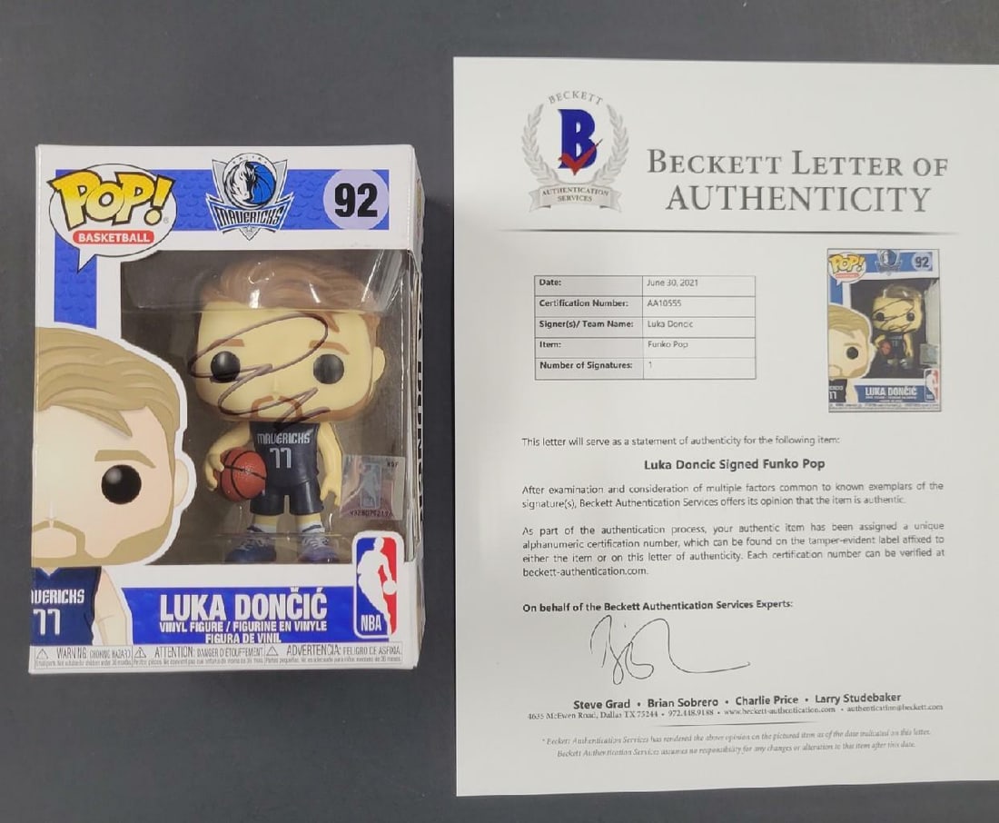 Luka Doncic Signed Dallas Mavericks Figure Beckett COA With Photo Proof: Luka Doncic Signed Dallas Mavericks Figure Beckett COA With Photo Proof This collectible Funko POP figure features Luka Doncic of the Dallas Mavericks, signed by the player. The autograph is authentic