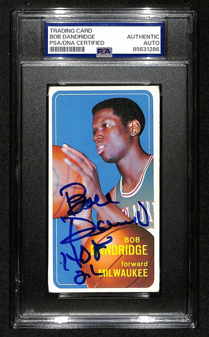 Bob Dandridge Signed 1970-71 Topps Card #63 HOF 21 PSA/DNA: Bob Dandridge Signed 1970-71 Topps Card #63 HOF 21 PSA/DNA This is an authentic 1970-71 TOPPS trading card featuring Bob Dandridge, who is a Hall of Fame player. The card is inscribed with "HOF 21" an