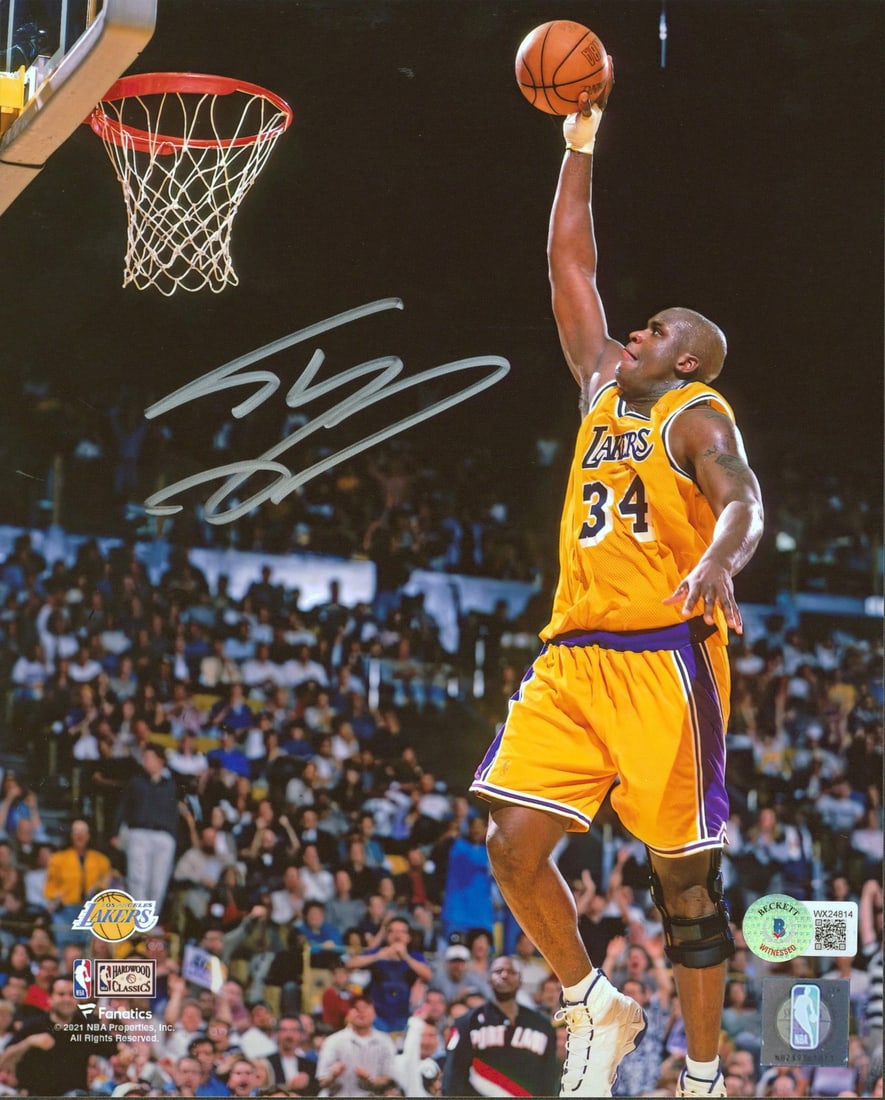 Shaquille O'Neal Signed 8x10 Dunk Photo Vs Blazers BAS Witnessed: Shaquille O'Neal Signed 8x10 Dunk Photo Vs Blazers BAS Witnessed This original 8x10 photo captures Shaquille O'Neal in a dynamic vertical dunk against the Blazers. Personally signed by the legendary c
