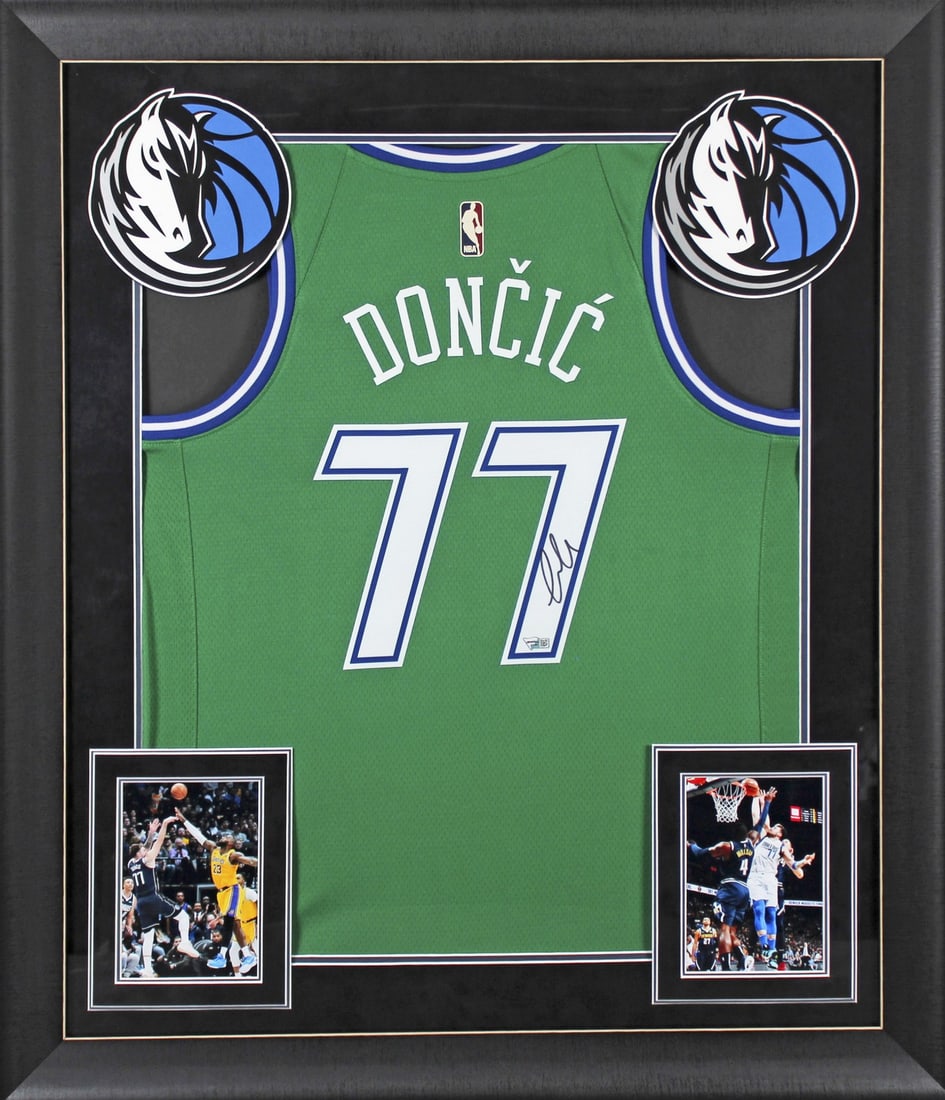 Framed Nike Swingman Jersey Signed by Luka Doncic Fanatics Authenticated: Framed Nike Swingman Jersey Signed by Luka Doncic Fanatics Authenticated This framed jersey features a green Nike Swingman jersey personally signed by Luka Doncic of the Dallas Mavericks. The autograp