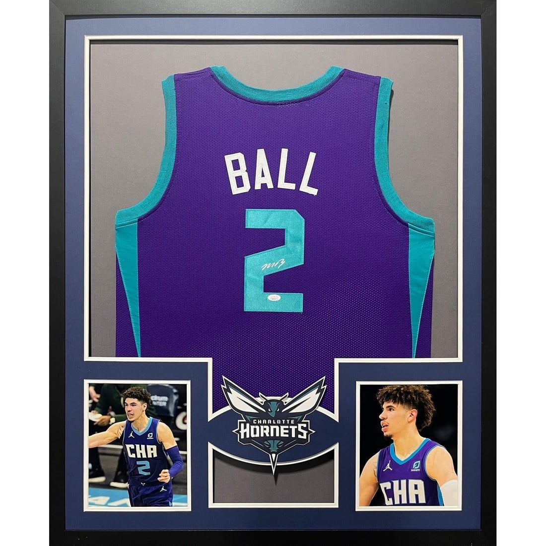 Framed Charlotte Hornets Jersey Signed by LaMelo Ball with JSA Authentication: Framed Charlotte Hornets Jersey Signed by LaMelo Ball with JSA Authentication This framed Charlotte Hornets jersey is autographed by LaMelo Ball and features professional JSA authentication with a tam