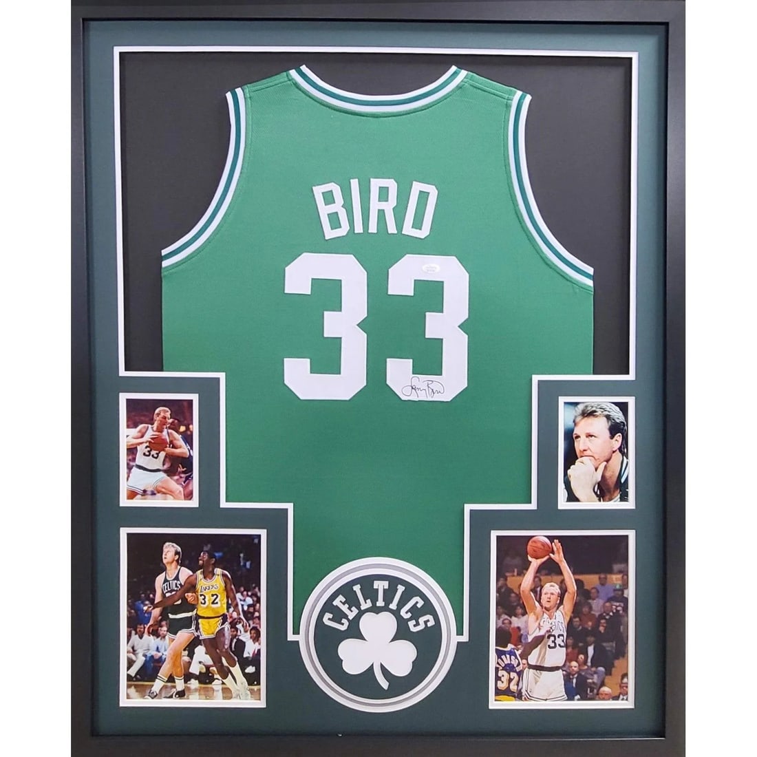 Framed Boston Celtics Jersey Signed by Larry Bird with JSA Authentication: Framed Boston Celtics Jersey Signed by Larry Bird with JSA Authentication This pre-owned Larry Bird Boston Celtics jersey is professionally framed and features Larry Bird's authentic signature. The au