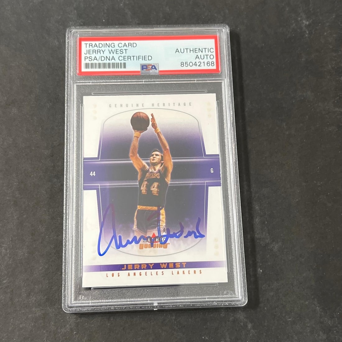 Jerry West Autographed 2004-05 Fleer Card PSA Encapsulated Lakers: Jerry West Autographed 2004-05 Fleer Card PSA Encapsulated Lakers This is a 2004-05 Fleer #102 basketball trading card featuring Jerry West of the Los Angeles Lakers. The standard-sized card is indivi