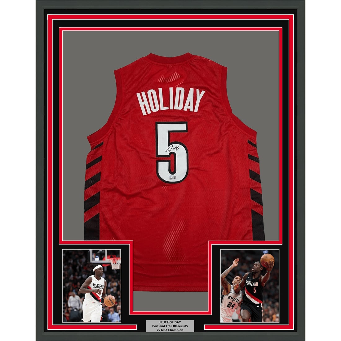 Jrue Holiday signed red Trail Blazers framed jersey BAS COA: Jrue Holiday signed red Trail Blazers framed jersey BAS COA This professionally framed and matted Portland Trail Blazers basketball jersey features the authentic autograph of Jrue Holiday. The display