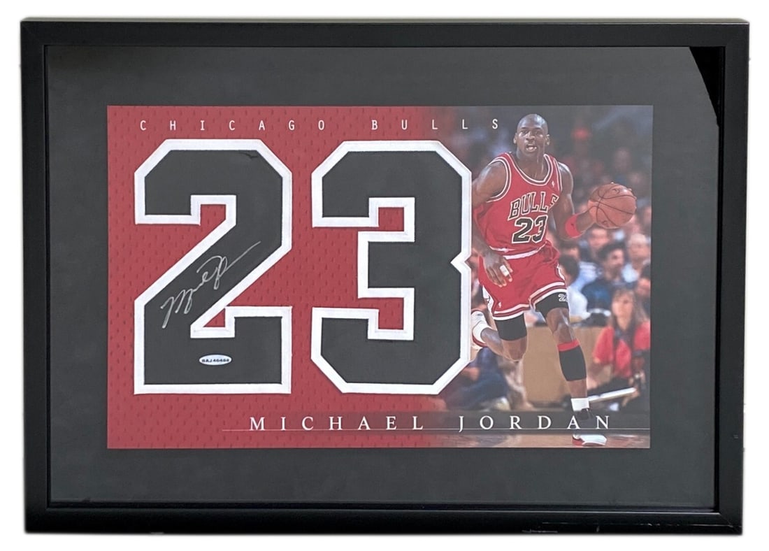 Michael Jordan Signed Jersey #23 Display with UDA COA 22x16: Michael Jordan Signed Jersey #23 Display with UDA COA 22x16 Celebrate basketball history with this authentic Michael Jordan signed jersey display featuring his iconic number 23. This framed piece meas