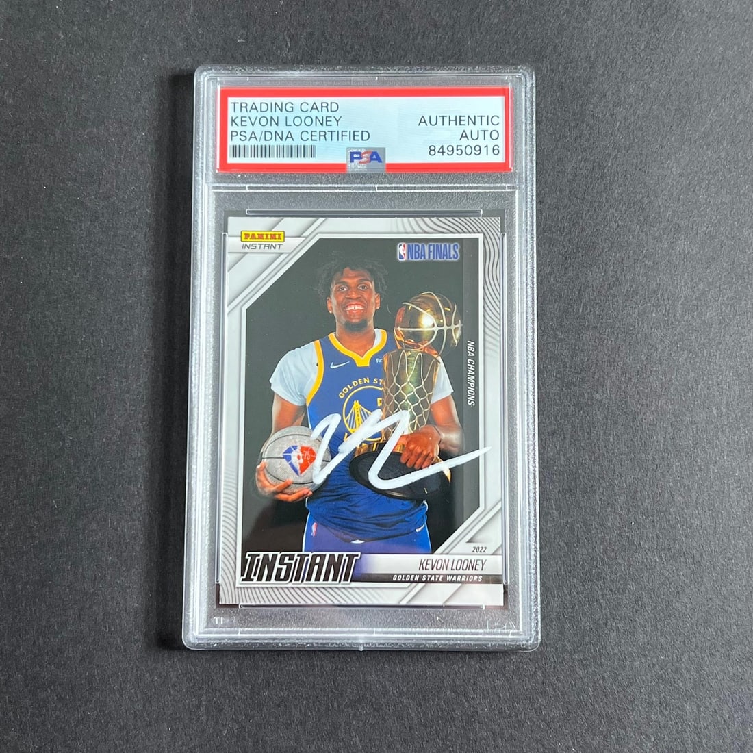 Kevon Looney Autographed 2021 Panini Instant Card PSA Encapsulated Warriors: Kevon Looney Autographed 2021 Panini Instant Card PSA Encapsulated Warriors This is a 2021 Panini Instant #10 trading card featuring Kevon Looney, who played for the Golden State Warriors. The card is