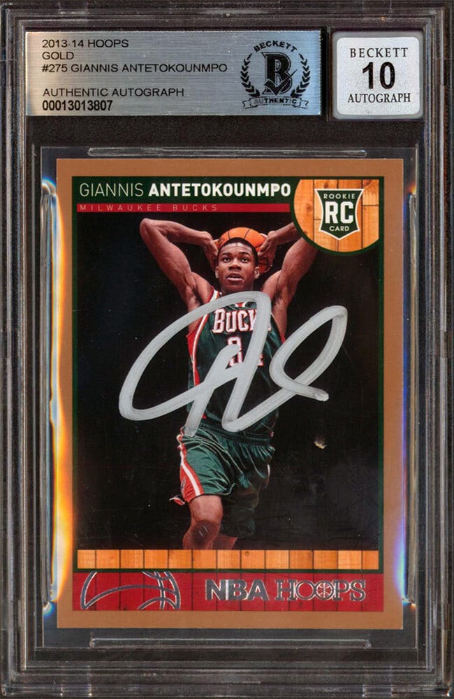 Giannis Antetokounmpo 2013-14 Hoops Gold Rookie Card Signed BAS 10 Slabbed: Giannis Antetokounmpo 2013-14 Hoops Gold Rookie Card Signed BAS 10 Slabbed This is a 2013-14 Hoops Gold #275 rookie card, personally signed by Giannis Antetokounmpo of the Milwaukee Bucks. The card is