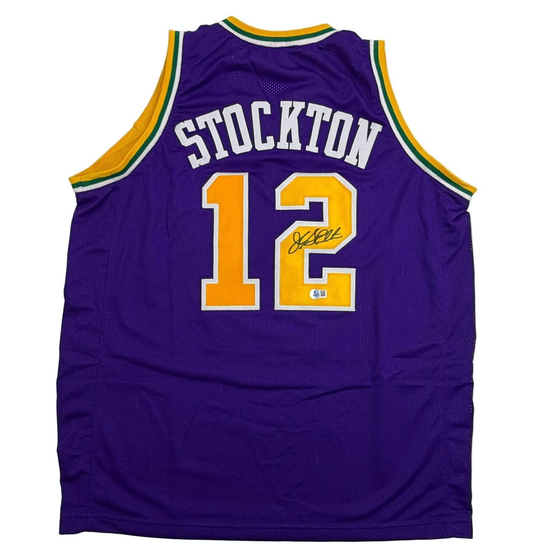 John Stockton Autographed Utah Jazz Purple Jersey Beckett COA: John Stockton Autographed Utah Jazz Purple Jersey Beckett COA This is an autographed John Stockton Utah Jazz purple basketball jersey, authenticated by Beckett Grading Services (BAS). The jersey is a 