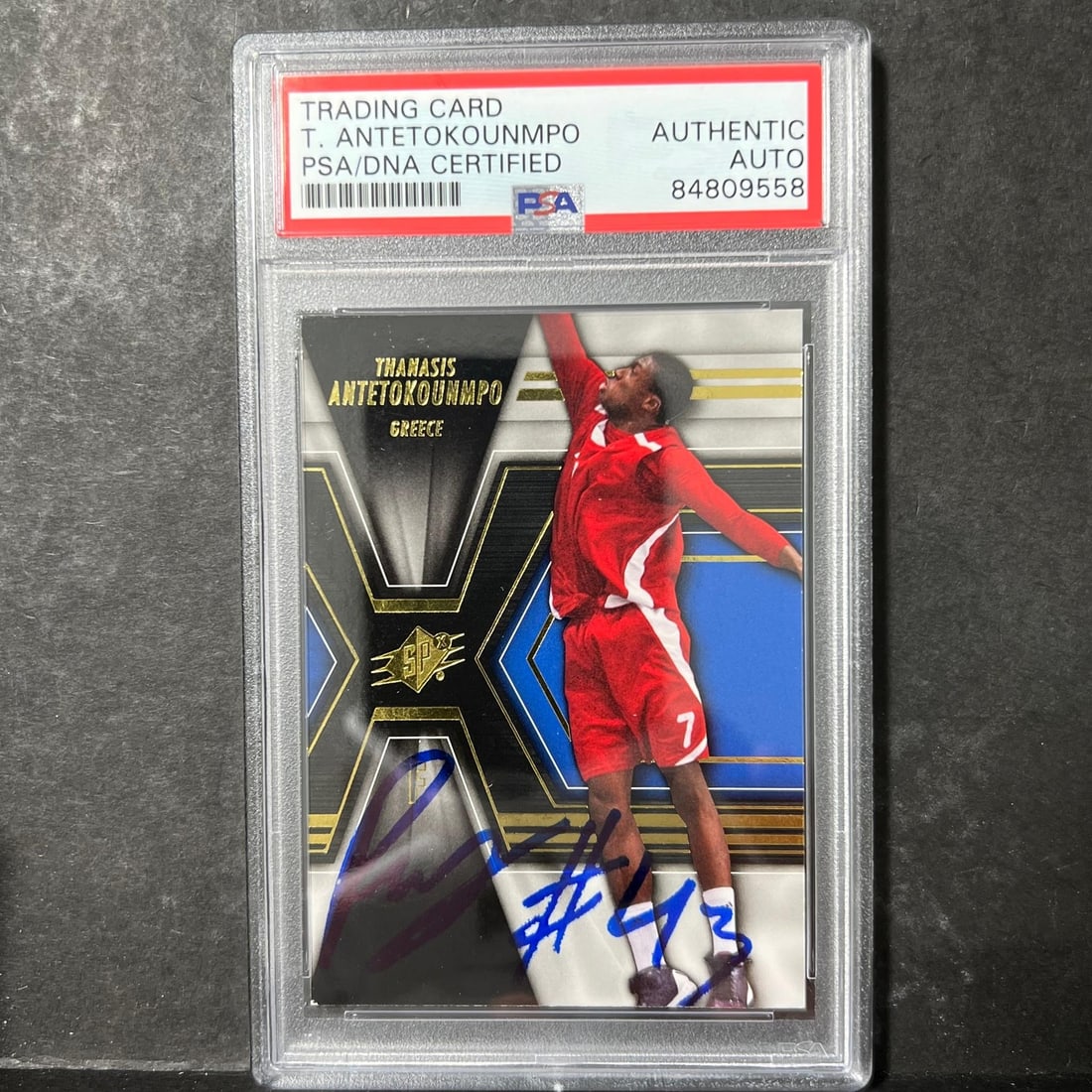 2014-15 Upper Deck SPX #75 Thanasis Antetokounmpo Signed Card PSA Authenticated: 2014-15 Upper Deck SPX #75 Thanasis Antetokounmpo Signed Card PSA Authenticated This 2014-15 Upper Deck SPX #75 card features the autograph of Thanasis Antetokounmpo, a rising star in the world of bas