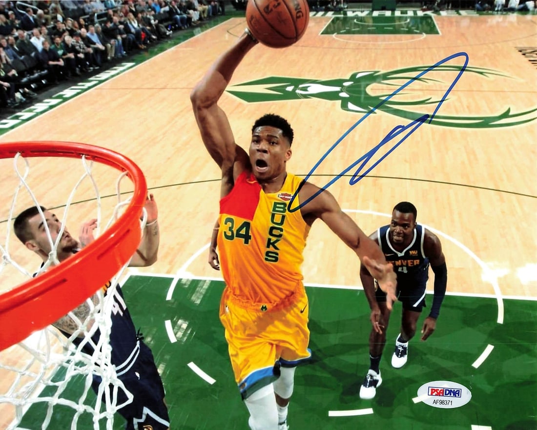 Giannis Antetokounmpo Autographed 8x10 Photo PSA/DNA Milwaukee Bucks: Giannis Antetokounmpo Autographed 8x10 Photo PSA/DNA Milwaukee Bucks This is an original 8x10 photograph featuring Giannis Antetokounmpo of the Milwaukee Bucks, personally signed by the NBA star. The 