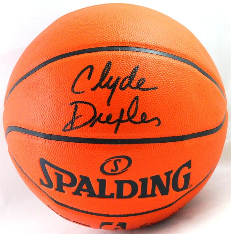 Spalding basketball signed by Clyde Drexler JSA witnessed (1 of 9)