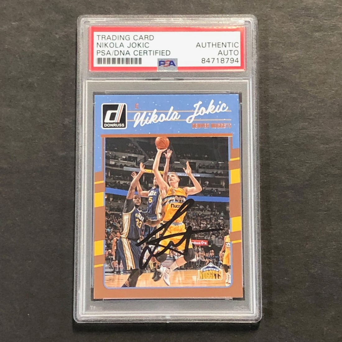2016-17 Donruss #90 Nikola Jokic Autographed PSA Slabbed Card: 2016-17 Donruss #90 Nikola Jokic Autographed PSA Slabbed Card Up for sale is a 2016-17 Donruss #90 sports trading card featuring Nikola Jokic of the Denver Nuggets. This card is autographed by Jokic a