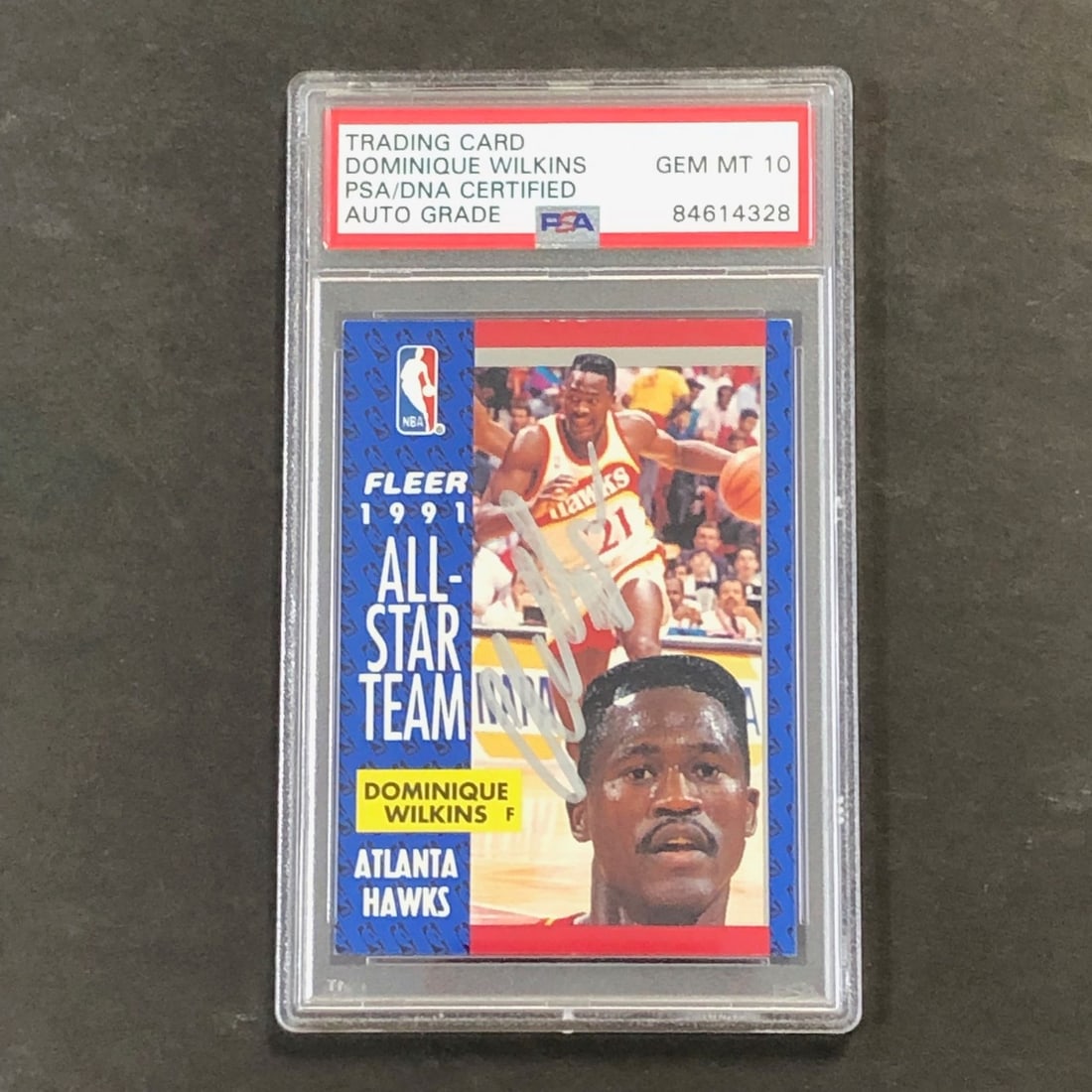 1991-92 Fleer Basketball All-Star #212 Dominique Wilkins Autographed Card PSA/DNA: 1991-92 Fleer Basketball All-Star #212 Dominique Wilkins Autographed Card PSA/DNA This is a 1991-92 Fleer Basketball All-Star #212 card beautifully signed by NBA legend Dominique Wilkins. The autograp