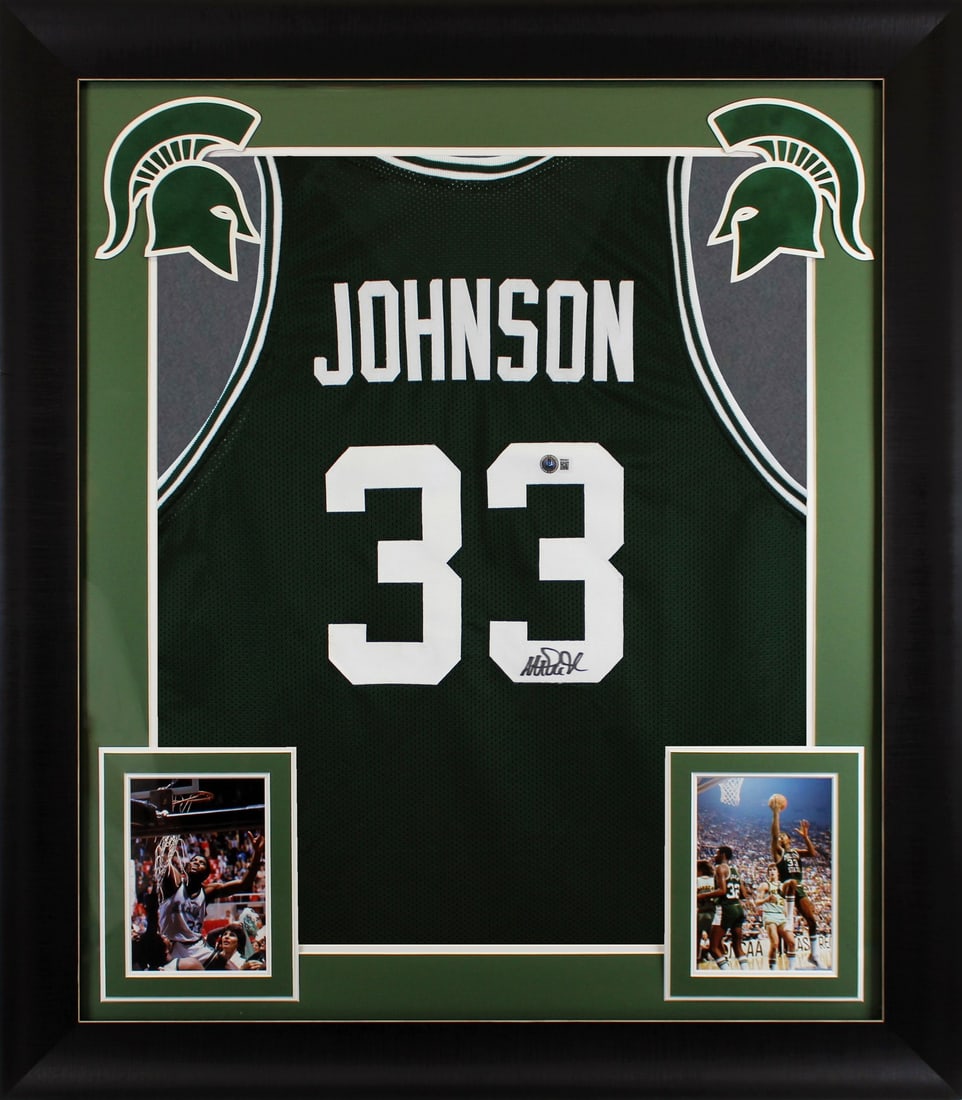 Framed Green Michigan State Jersey Signed by Magic Johnson BAS Witnessed: Framed Green Michigan State Jersey Signed by Magic Johnson BAS Witnessed This professionally framed green pro-style jersey has been personally signed by Magic Johnson of the Michigan State Spartans. A