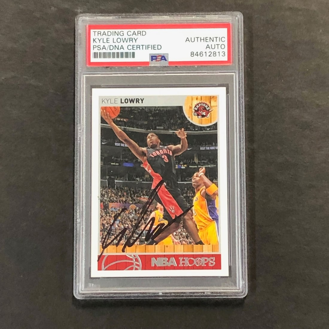 2013-14 NBA Hoops #164 Kyle Lowry Signed Card PSA Authenticated Raptors: 2013-14 NBA Hoops #164 Kyle Lowry Signed Card PSA Authenticated Raptors This 2013-14 NBA Hoops #164 trading card features the autograph of Kyle Lowry, a prominent player for the Toronto Raptors. The s