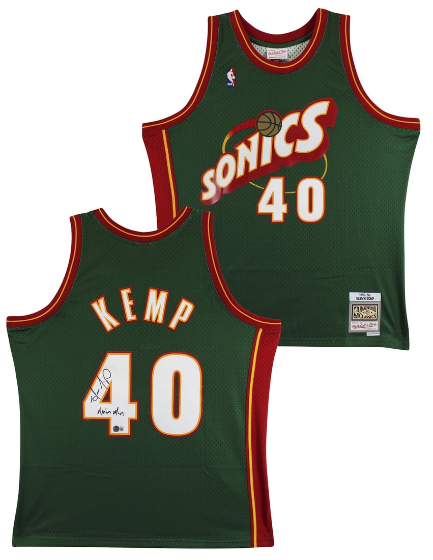 Shawn Kemp autographed Supersonics Swingman jersey with Reign Man inscription BAS: Shawn Kemp autographed Supersonics Swingman jersey with Reign Man inscription BAS This green Mitchell & Ness 1995-96 Hardwood Classics Swingman jersey has been personally signed by Shawn Kemp of the S