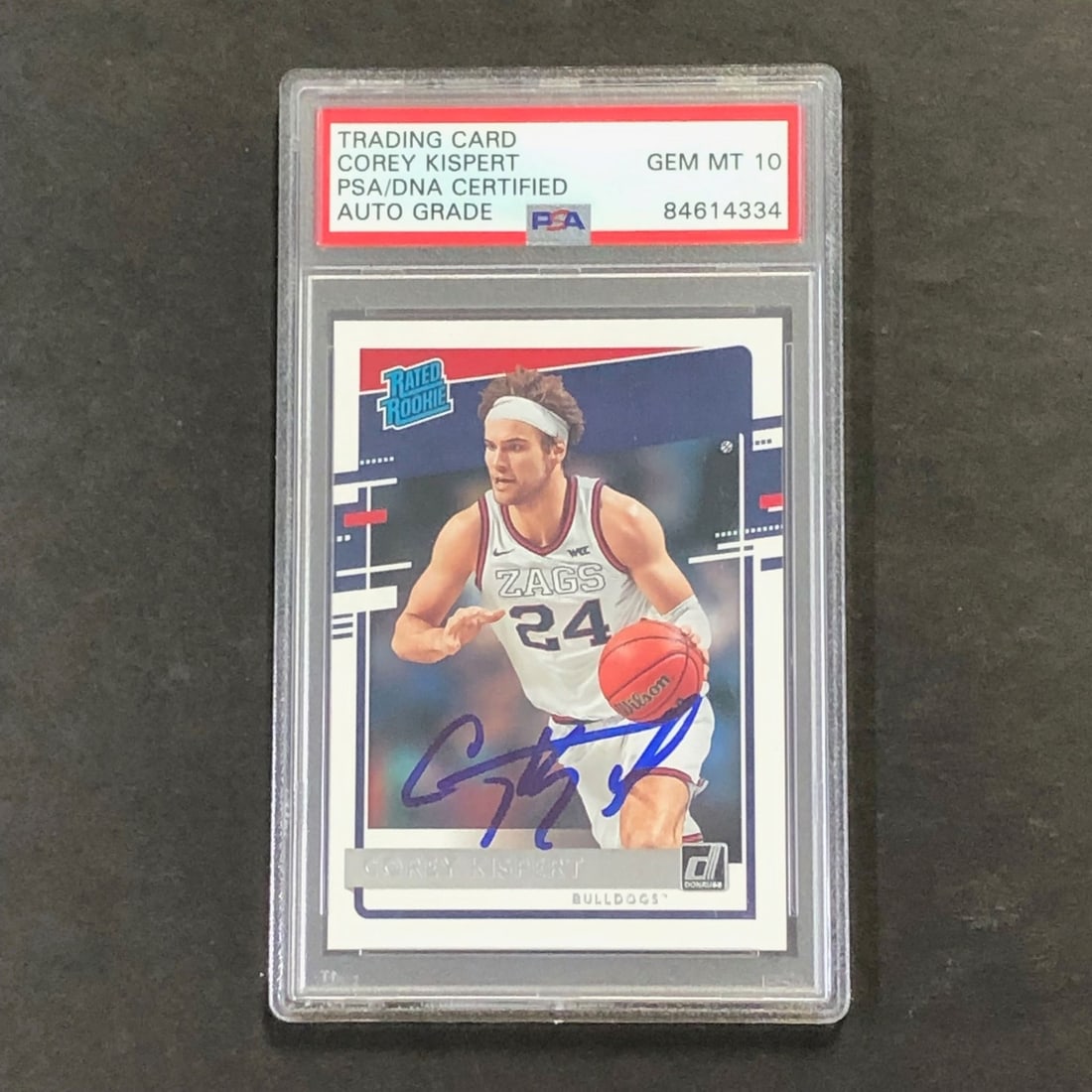 Corey Kispert Signed 2021-22 Rated Rookie Card Authenticated by PSA/DNA: Corey Kispert Signed 2021-22 Rated Rookie Card Authenticated by PSA/DNA This is an original 2021-22 Chronicles Donruss Rated Rookie #33 basketball card featuring Corey Kispert. The card is autographed