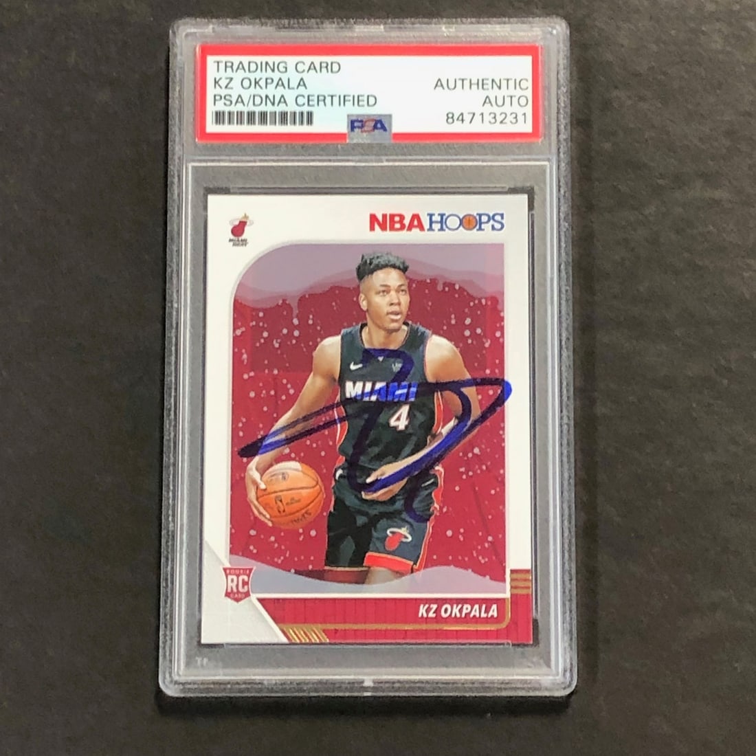 2019-20 NBA Hoops KZ Okpala Signed Rookie Card PSA Authenticated: 2019-20 NBA Hoops KZ Okpala Signed Rookie Card PSA Authenticated This is a 2019-20 NBA Hoops #226 Rookie Card featuring the autograph of KZ Okpala, a promising player from the Miami Heat. The card's s