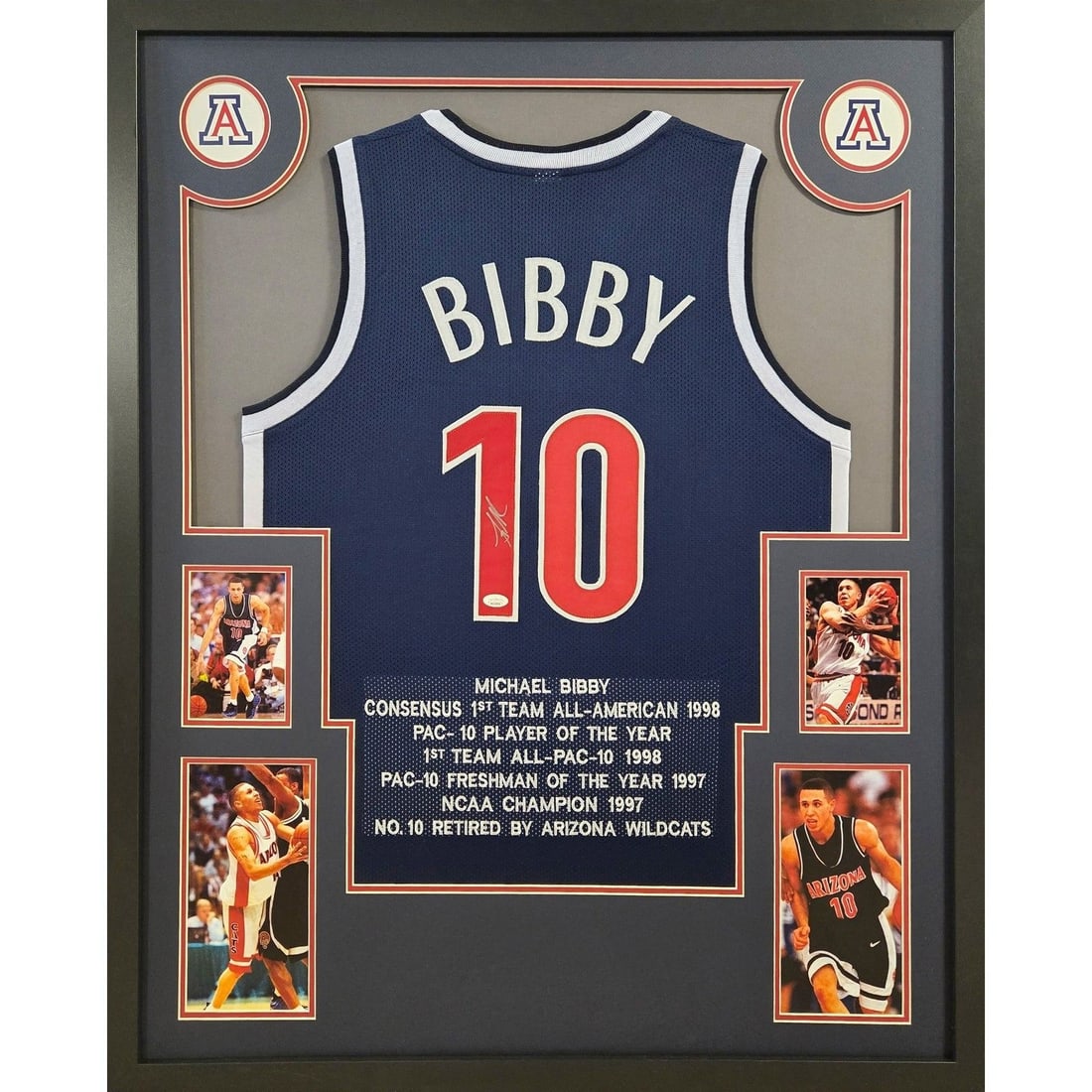 Framed Mike Bibby Autographed Arizona Wildcats Jersey JSA: Framed Mike Bibby Autographed Arizona Wildcats Jersey JSA This framed jersey features the autograph of Mike Bibby, commemorating his time with the Arizona Wildcats. The jersey is professionally framed