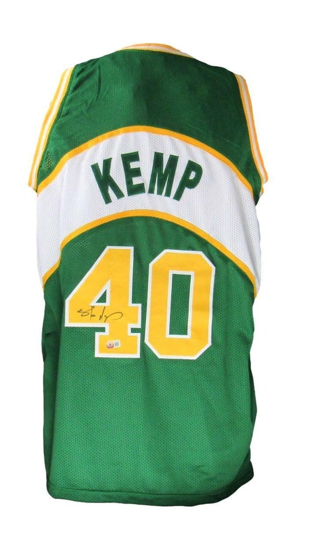 Seattle Supersonics Green Jersey Signed by Shawn Kemp with Beckett Authentication: Seattle Supersonics Green Jersey Signed by Shawn Kemp with Beckett Authentication This is a pre-owned Seattle Supersonics green custom basketball jersey, signed by Shawn Kemp. The jersey is size XL an