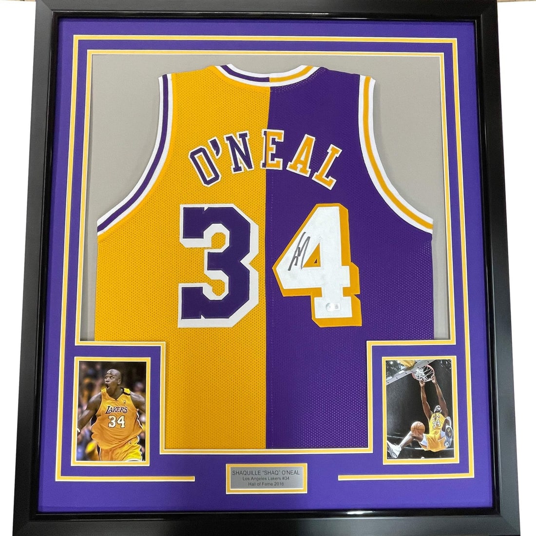 Framed Shaquille O Neal signed Lakers jersey BAS COA 33x42: Framed Shaquille O Neal signed Lakers jersey BAS COA 33x42 This framed Shaquille O'Neal split Los Angeles Lakers jersey features an authentic signature from the NBA legend. The jersey is professionall