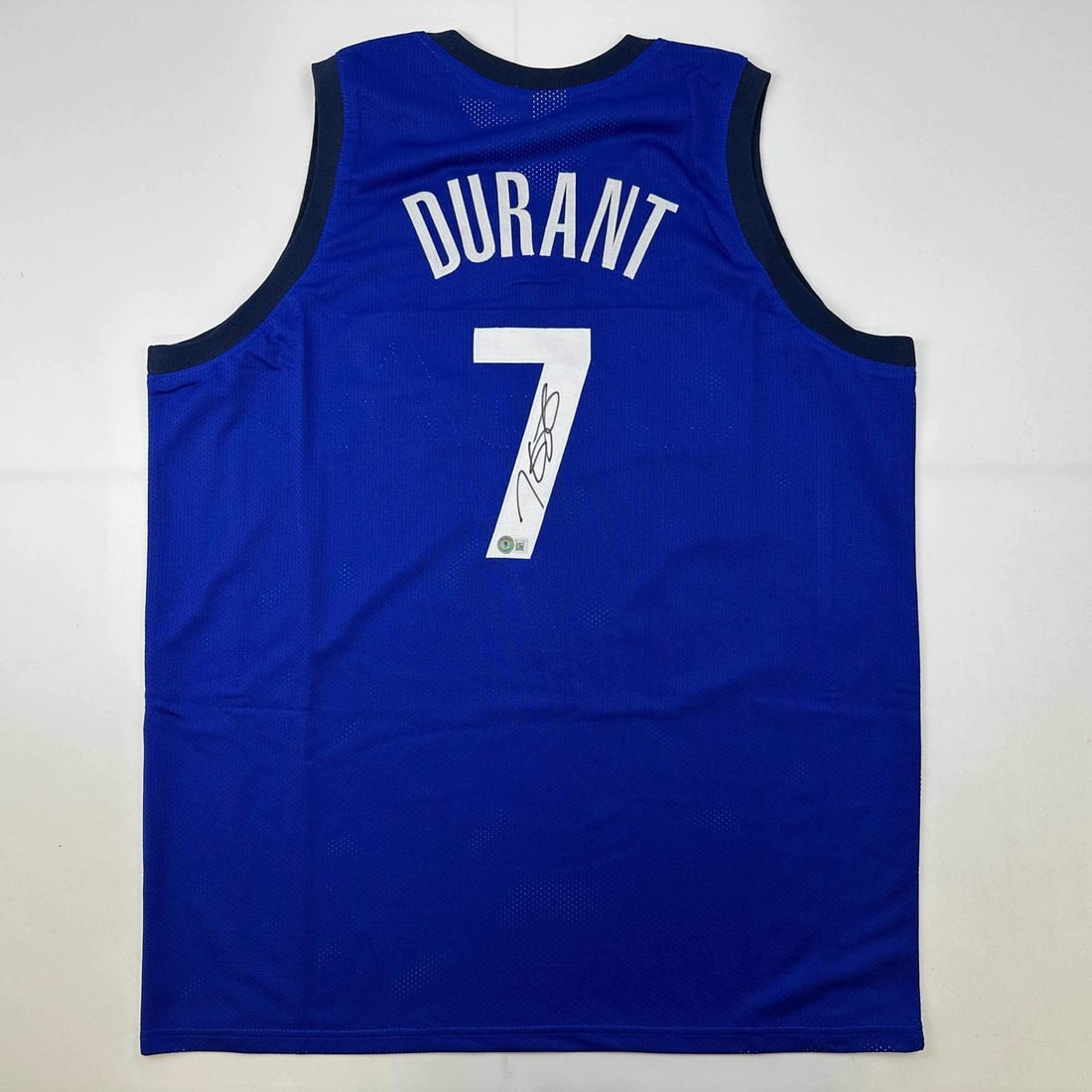 Kevin Durant Autographed USA Blue Jersey Beckett BAS COA: Kevin Durant Autographed USA Blue Jersey Beckett BAS COA Celebrate the legacy of Kevin Durant with this autographed custom USA blue jersey. This authentic piece, certified by Beckett Grading Services,