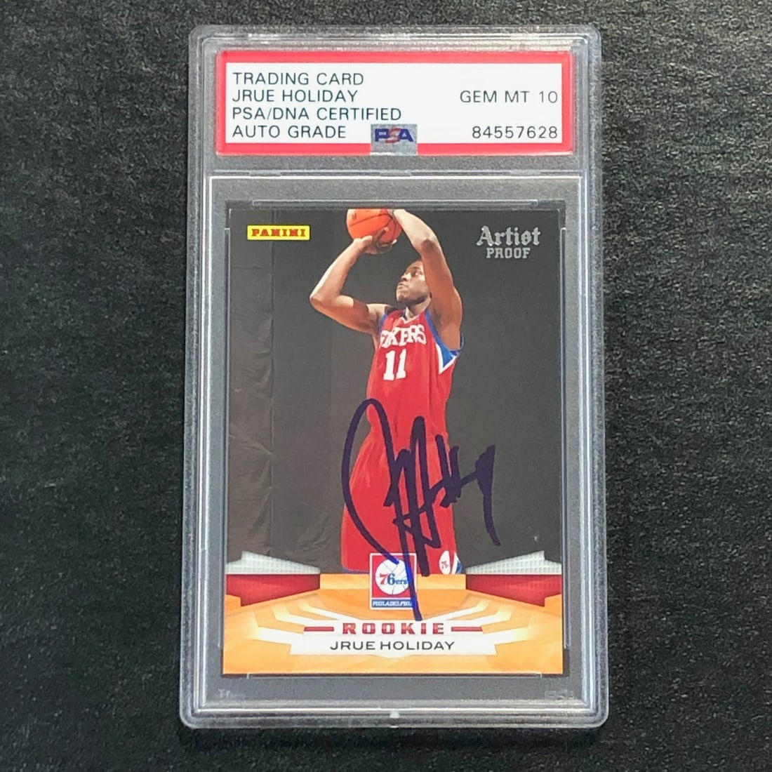 PSA authenticated Jrue Holiday rookie card Panini 367 76ers autograph: PSA authenticated Jrue Holiday rookie card Panini 367 76ers autograph This is a 2009-10 Panini #367 rookie card featuring Jrue Holiday of the Philadelphia 76ers. The card has been personally signed by