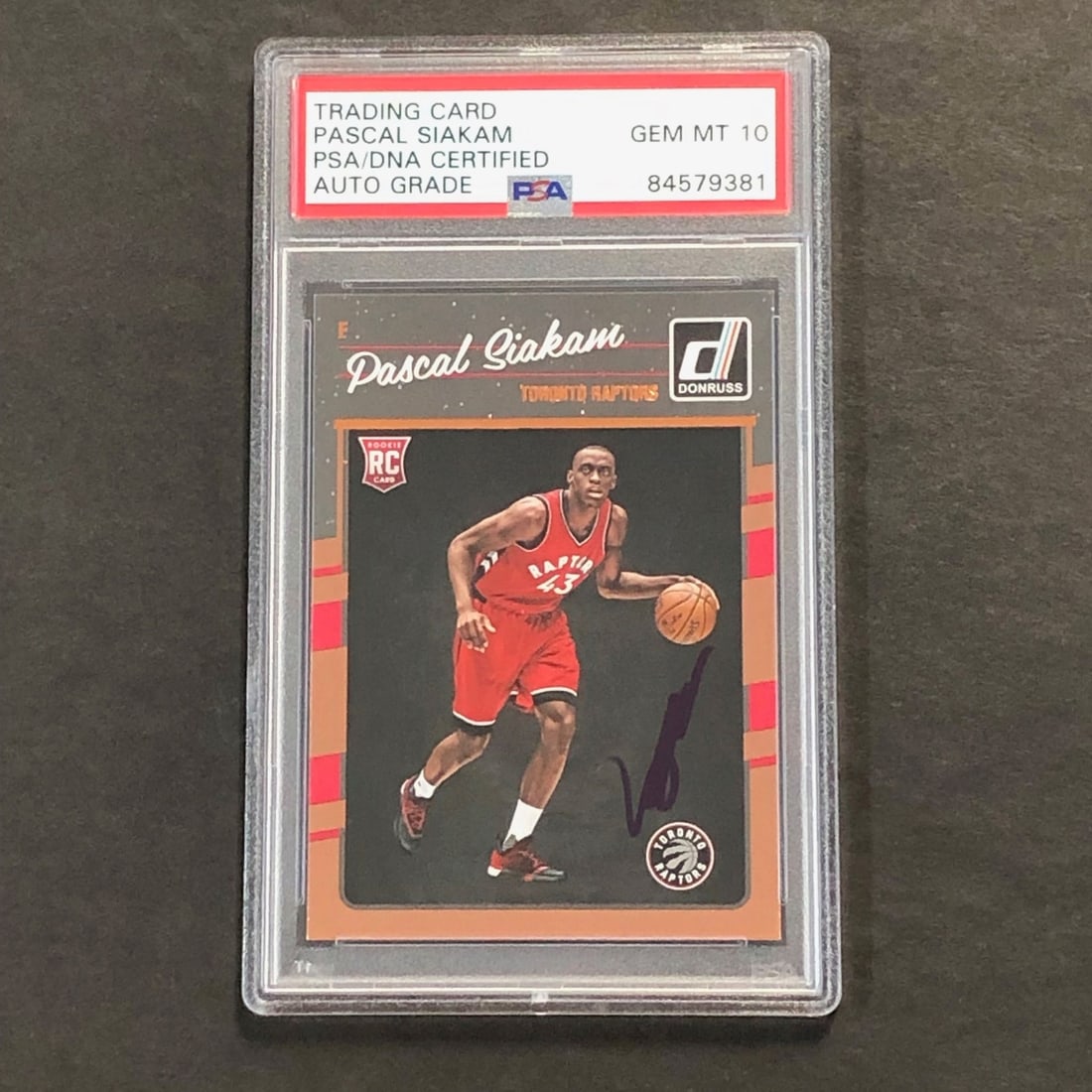 2016-17 Donruss Pascal Siakam Signed Rookie Card PSA/DNA Authentic: 2016-17 Donruss Pascal Siakam Signed Rookie Card PSA/DNA Authentic This is an original 2016-17 Donruss #171 basketball card featuring the signature of Pascal Siakam, a rising star in the NBA. The card