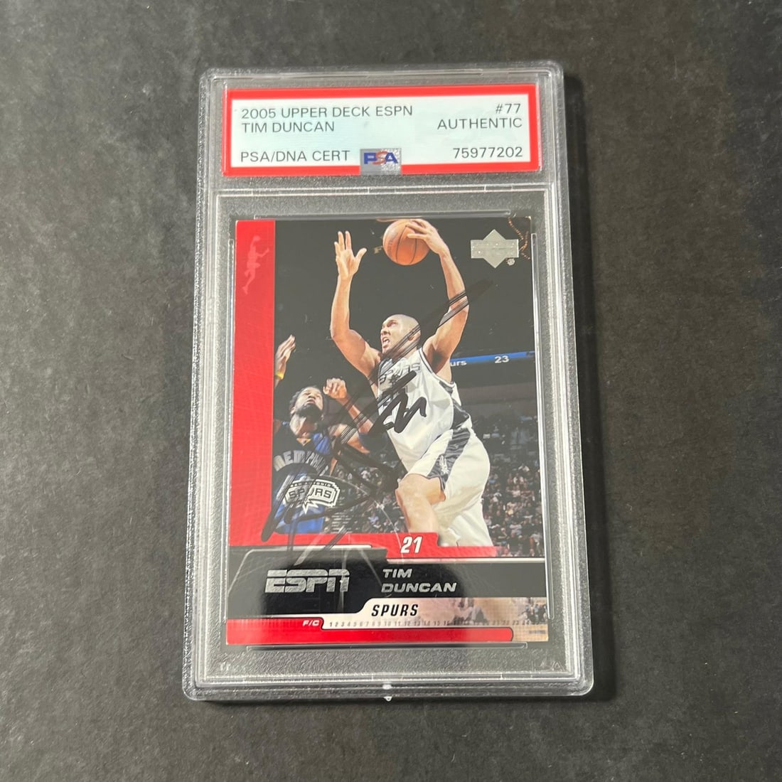 Tim Duncan autographed 2005 Upper Deck ESPN #77 PSA slabbed card: Tim Duncan autographed 2005 Upper Deck ESPN #77 PSA slabbed card This is a 2005 Upper Deck ESPN #77 basketball trading card featuring Tim Duncan of the San Antonio Spurs. The card has been personally 