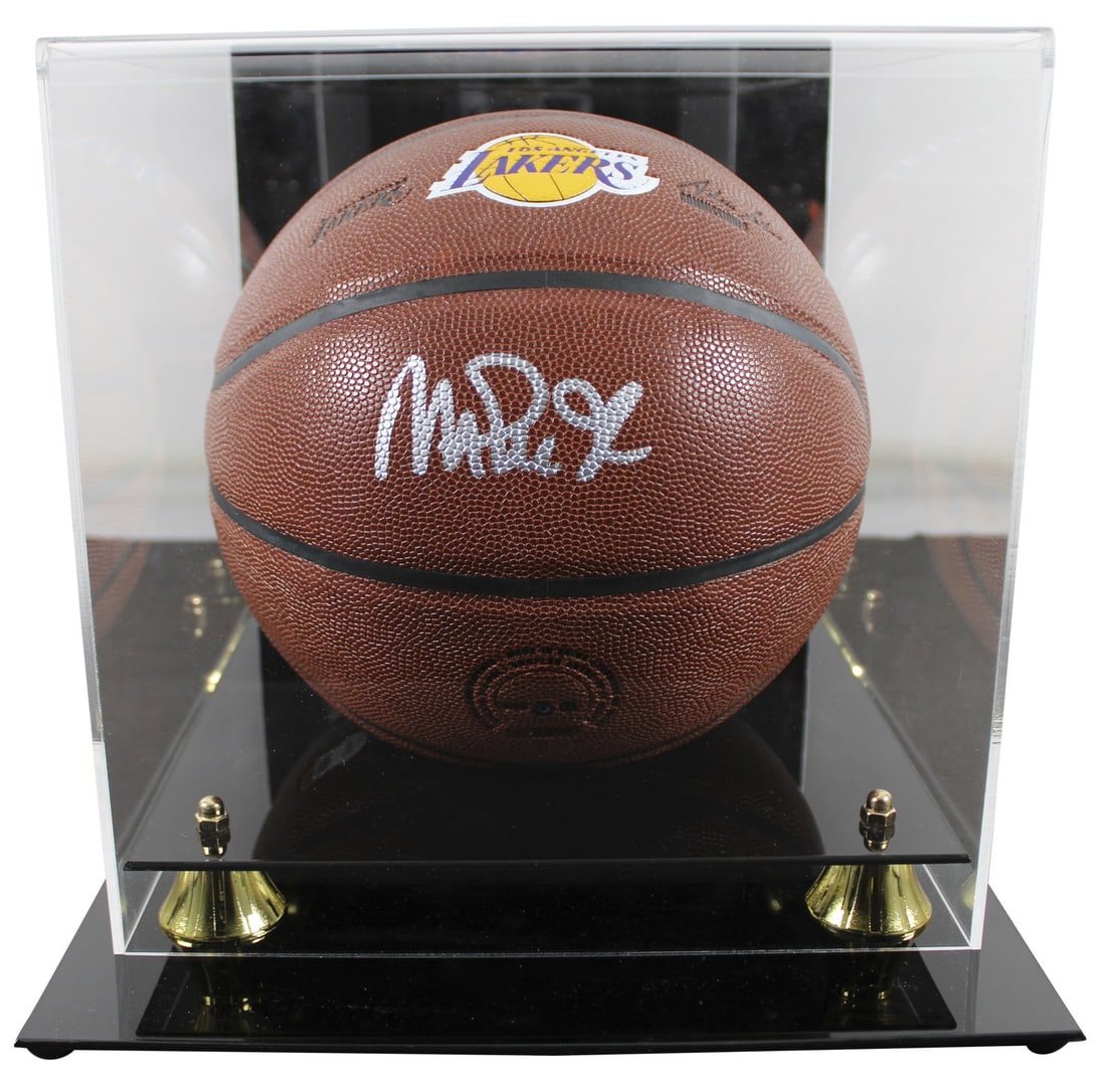 Magic Johnson Signed Lakers Basketball with Beckett Authentication: Magic Johnson Signed Lakers Basketball with Beckett Authentication Celebrate the legacy of Magic Johnson with this authentic signed basketball. This original Brown Wilson Lakers logo basketball has be