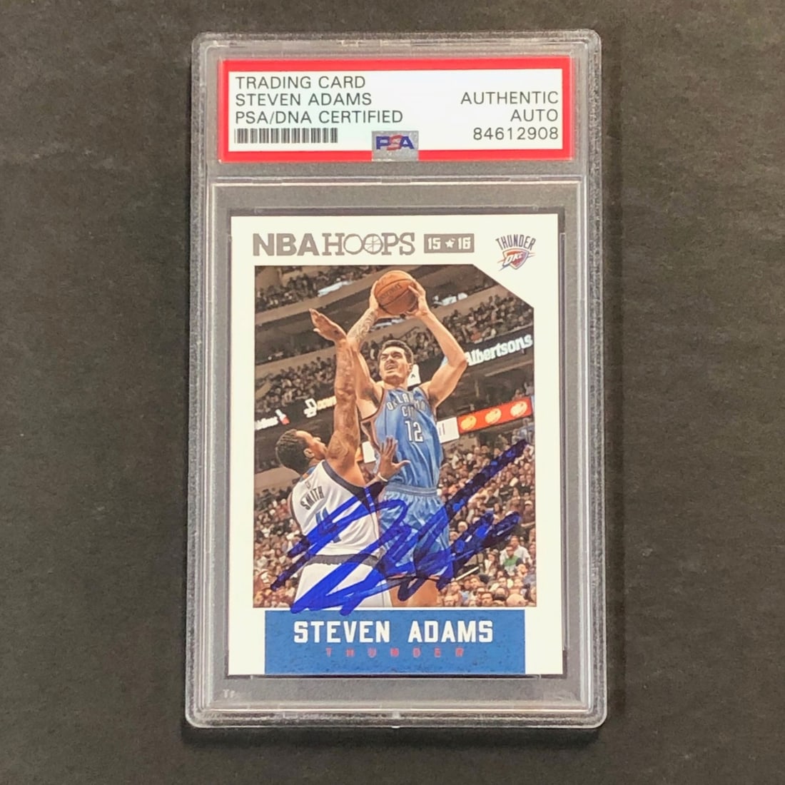 2015-16 NBA Hoops #258 Steven Adams Autographed Card PSA/DNA Encapsulated: 2015-16 NBA Hoops #258 Steven Adams Autographed Card PSA/DNA Encapsulated This is a 2015-16 NBA Hoops #258 trading card signed by Steven Adams, a prominent player in the NBA. The autograph has been au