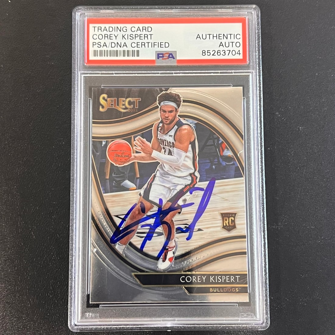 2021 Panini Select #283 Corey Kispert Signed PSA/DNA Authenticated Card: 2021 Panini Select #283 Corey Kispert Signed PSA/DNA Authenticated Card This is a 2021 Panini Select #283 card featuring the signature of Corey Kispert, a standout player from Gonzaga. The autograph h