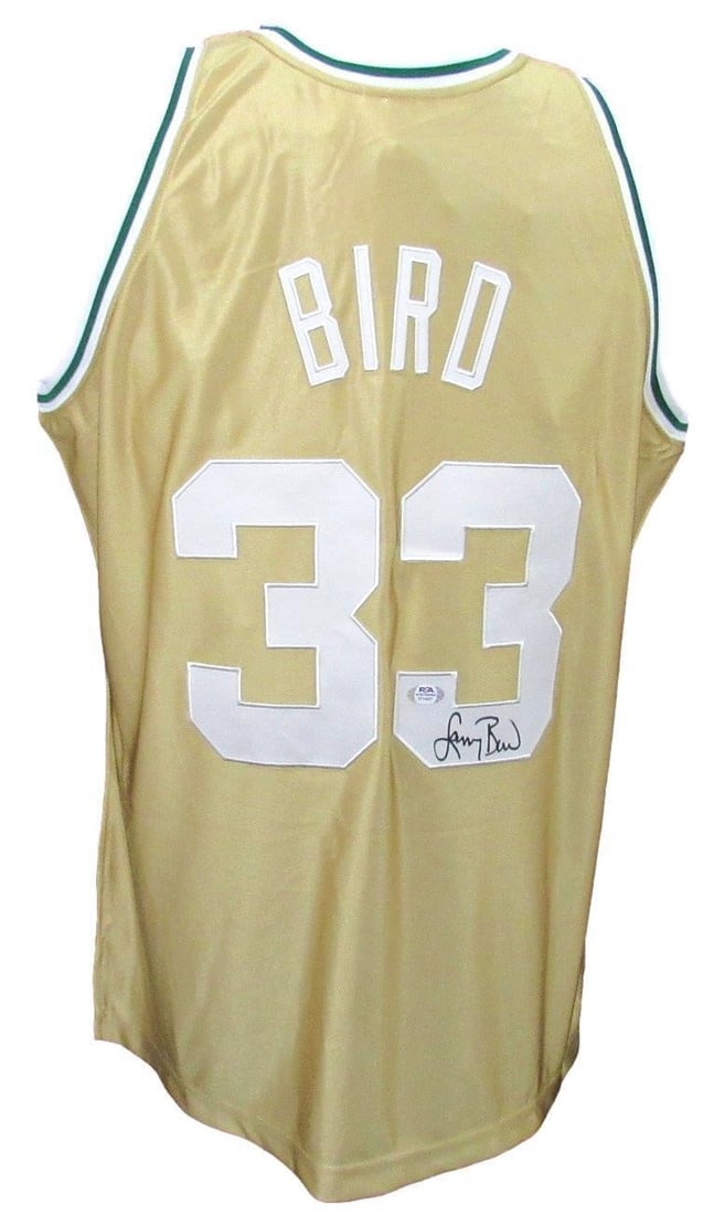 Larry Bird Autographed Gold Mitchell & Ness Celtics Jersey PSA/DNA: Larry Bird Autographed Gold Mitchell & Ness Celtics Jersey PSA/DNA Celebrate basketball history with this Larry Bird autographed gold Mitchell & Ness 1985-86 HWC Swingman jersey, honoring the NBA's 75