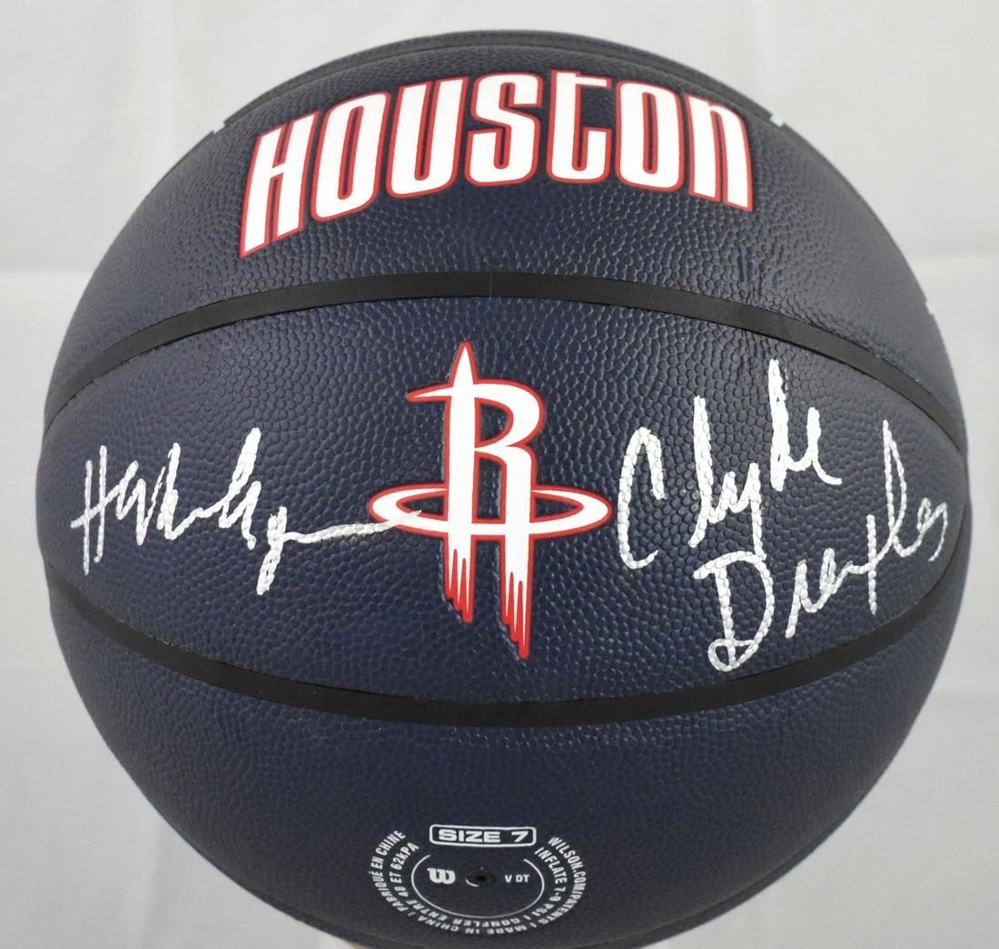 Wilson City Edition Basketball Signed by Hakeem Olajuwon and Clyde Drexler Beckett: Wilson City Edition Basketball Signed by Hakeem Olajuwon and Clyde Drexler Beckett This NBA Wilson City Edition basketball is signed by Hakeem Olajuwon and Clyde Drexler. It is an original item associ