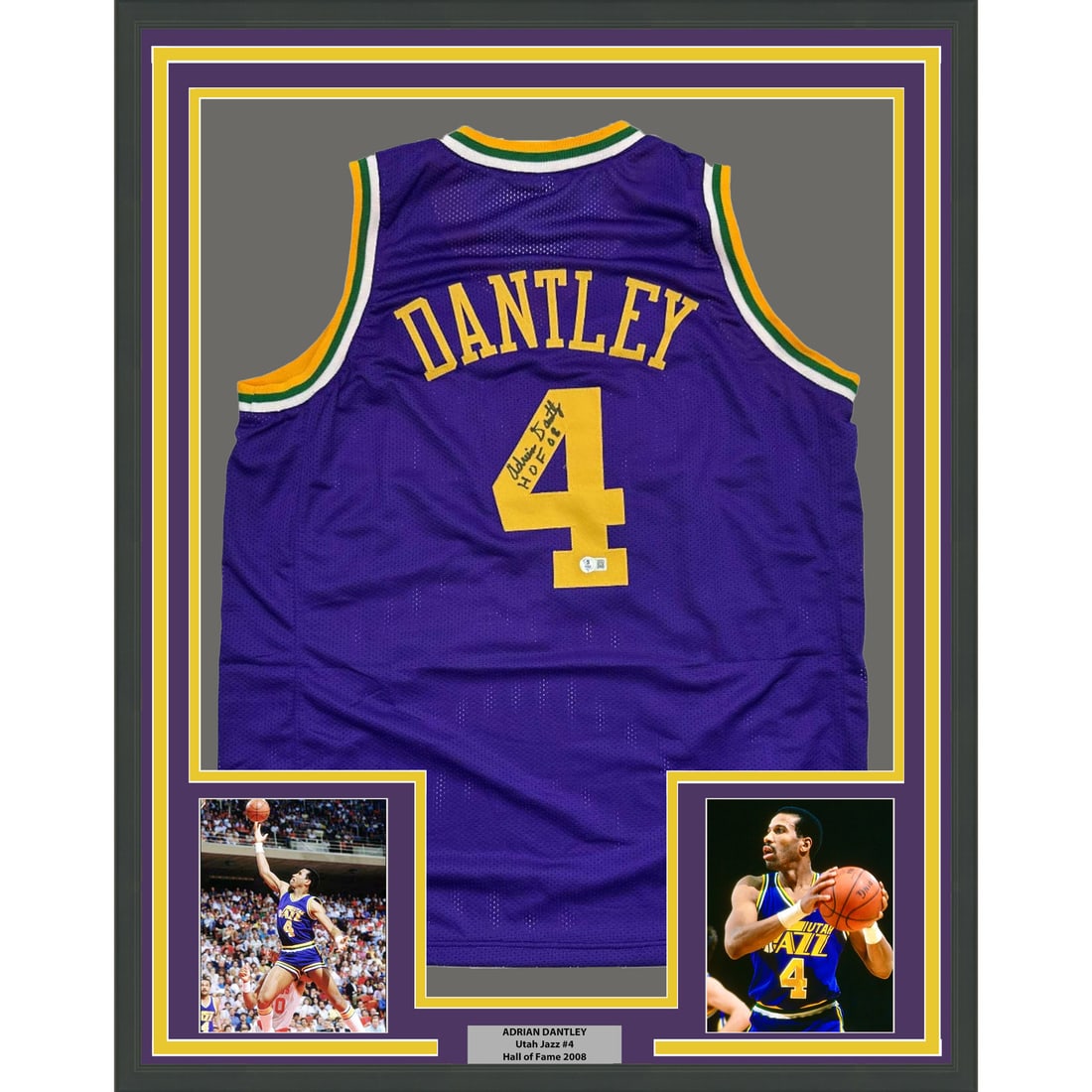 Adrian Dantley Signed Utah Jazz 35x39 Framed Jersey Beckett Authenticated: Adrian Dantley Signed Utah Jazz 35x39 Framed Jersey Beckett Authenticated This professionally framed and matted Utah Jazz purple jersey features the autograph of Hall of Famer Adrian Dantley. The disp