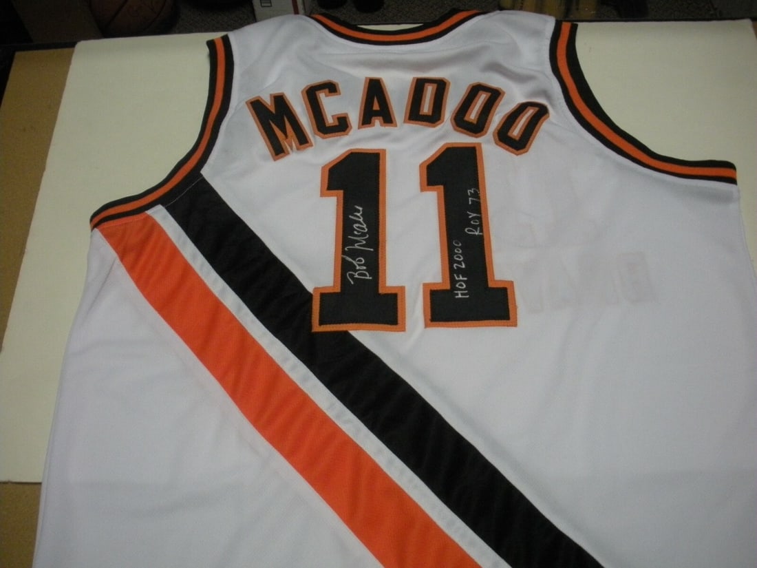 Signed Buffalo Braves Jersey Bob McAdoo 1975 MVP with COA: Signed Buffalo Braves Jersey Bob McAdoo 1975 MVP with COA This is a pre-owned white Buffalo Braves basketball jersey signed by Hall of Famer Bob McAdoo, who was the 1975 NBA MVP and inducted into the 