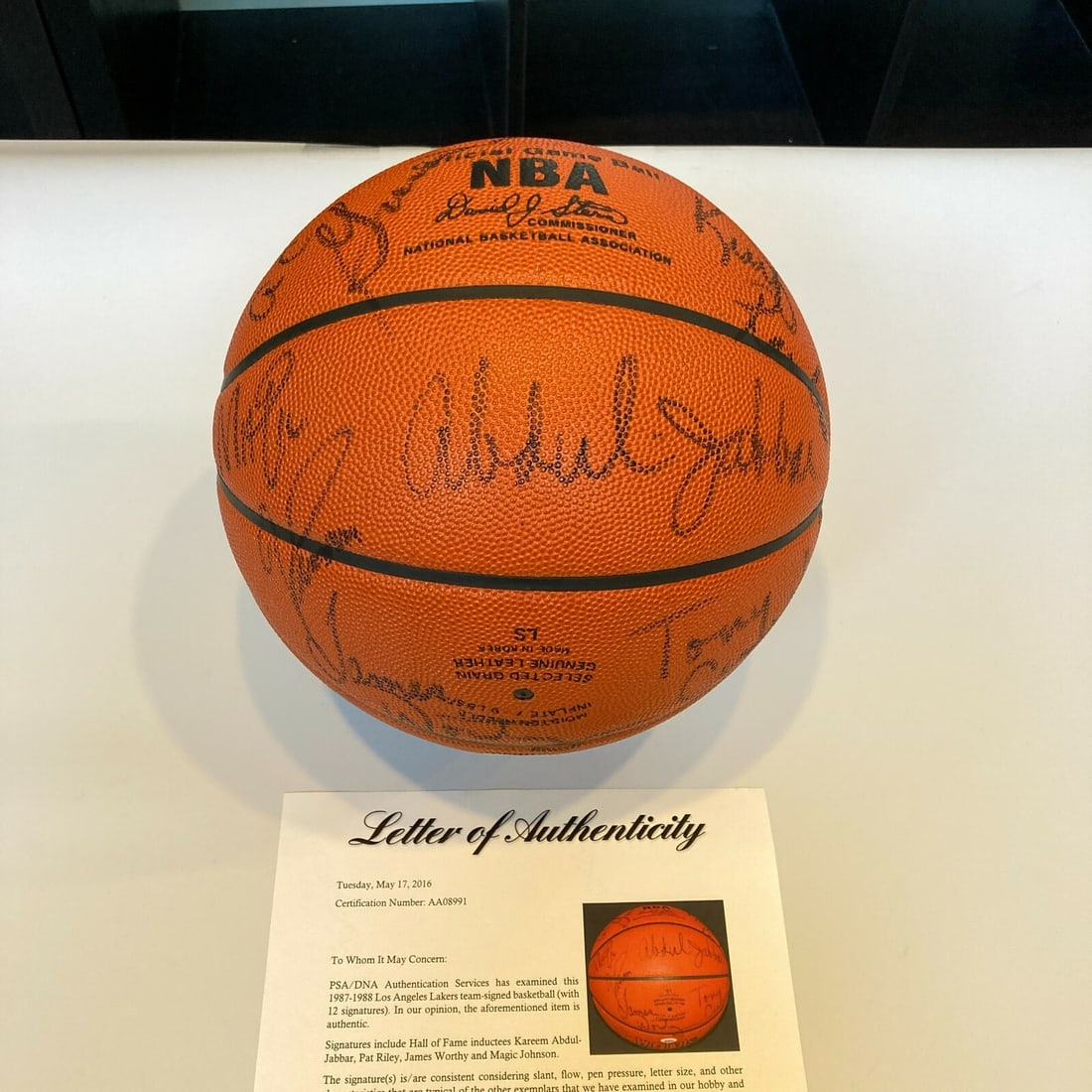1987-88 Lakers Team Signed NBA Basketball with PSA DNA COA: 1987-88 Lakers Team Signed NBA Basketball with PSA DNA COA Celebrate the legendary 1987-88 Los Angeles Lakers with this authentic NBA game basketball, signed by 12 iconic members of the "Showtime" tea
